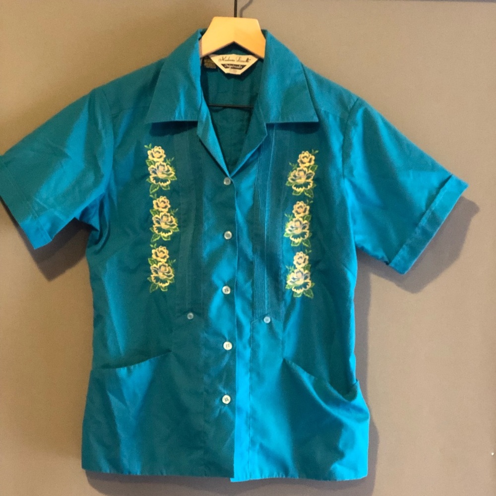 Teal blue guaberra with yellow flowers details